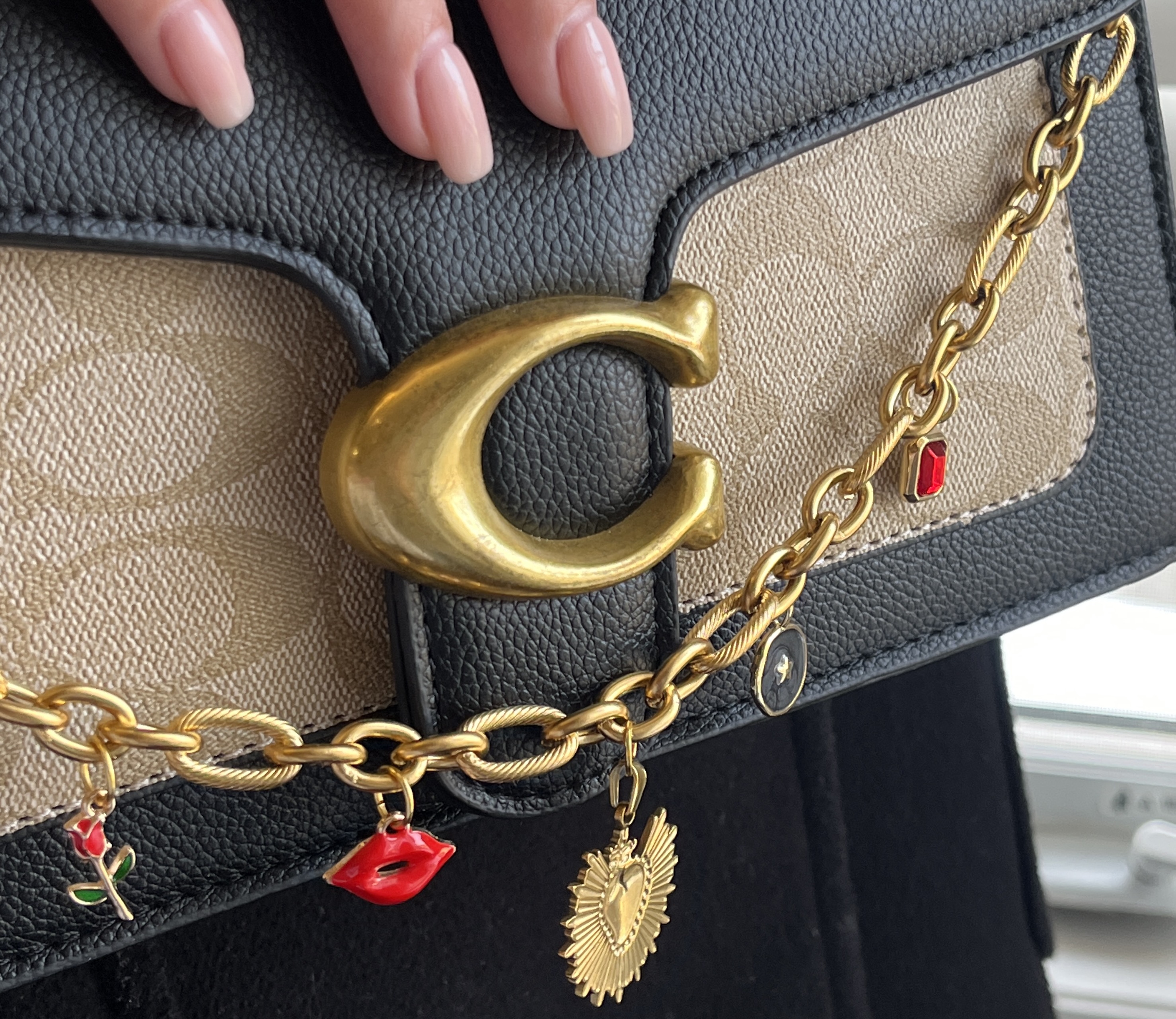 Cross chain bag charm style